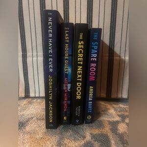 Set of 4 paper back books